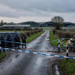 Police cordon and bomb-disposal team outside RAF Fairford airbase