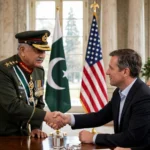 Field Marshal Syed Asim Munir in ceremonial uniform shaking hands with members of the US Afghanistan War Commission delegation, with Pakistan and United States flags in the background.