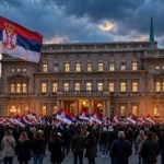 Supporters wave Serbian flags outside the presidential palace in Belgrade