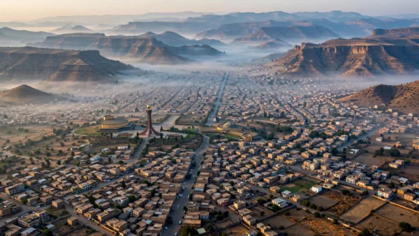 Aerial view of Mekelle, the capital of Ethiopia's Tigray region, nestled among highland mountains at dawn.