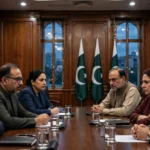 Pakistani government and opposition delegations in tense talks across a conference table beneath Pakistani flags