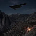 A B-2 stealth bomber flying over mountainous terrain at night during a military strike